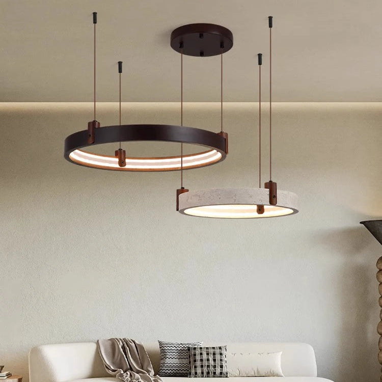 Modern living room with pendant lights and a white sofa.