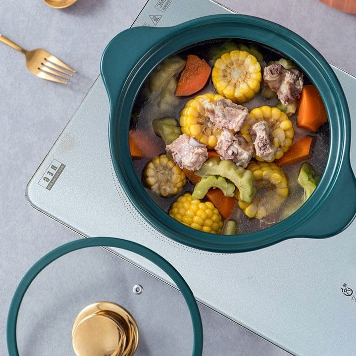 https://blackbrdstore.com/cdn/shop/products/Orange-Green-Ceramic-Cooking-Pot-with-Lid-Blackbrdstore-524_1445x.jpg?v=1680641553